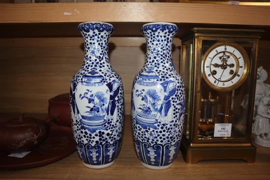 A pair of 19th century Chinese blue and white vases height 30cm